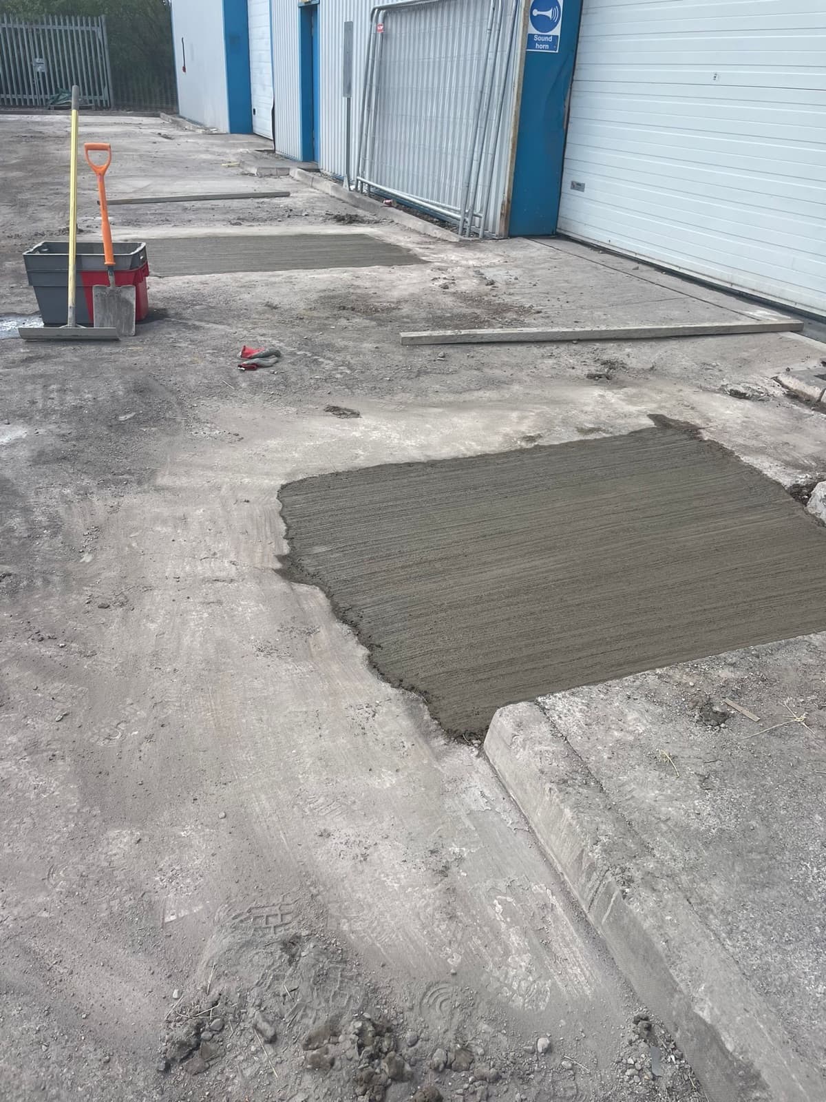 Newly reinstated concrete areas outside industrial units