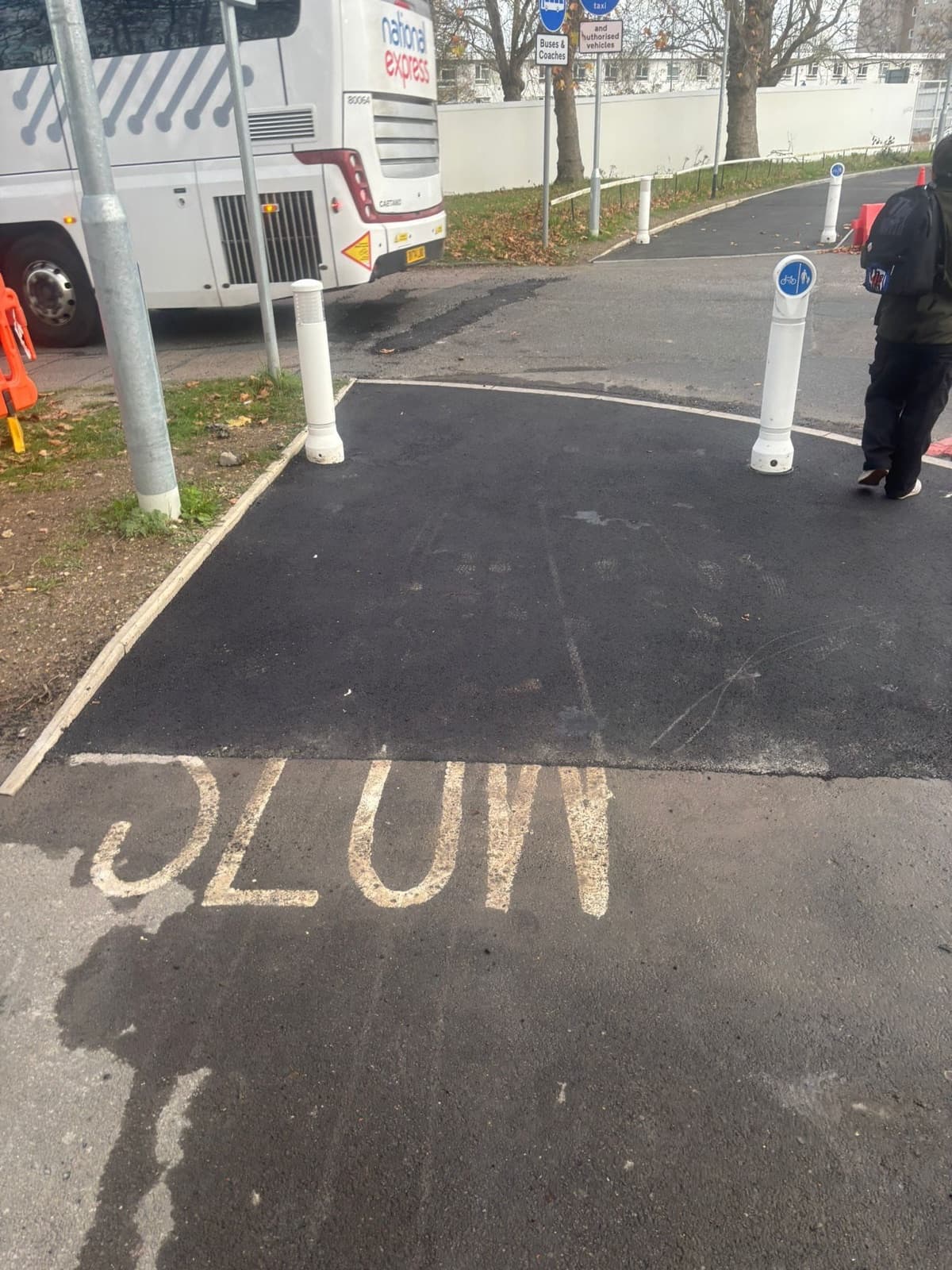 Resurfaced pedestrian access route with bollards